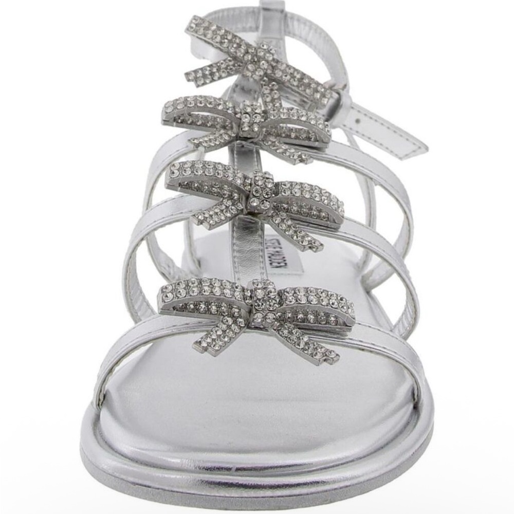 Brand new Steve Madden “Jemmy” silver Sandals with bows